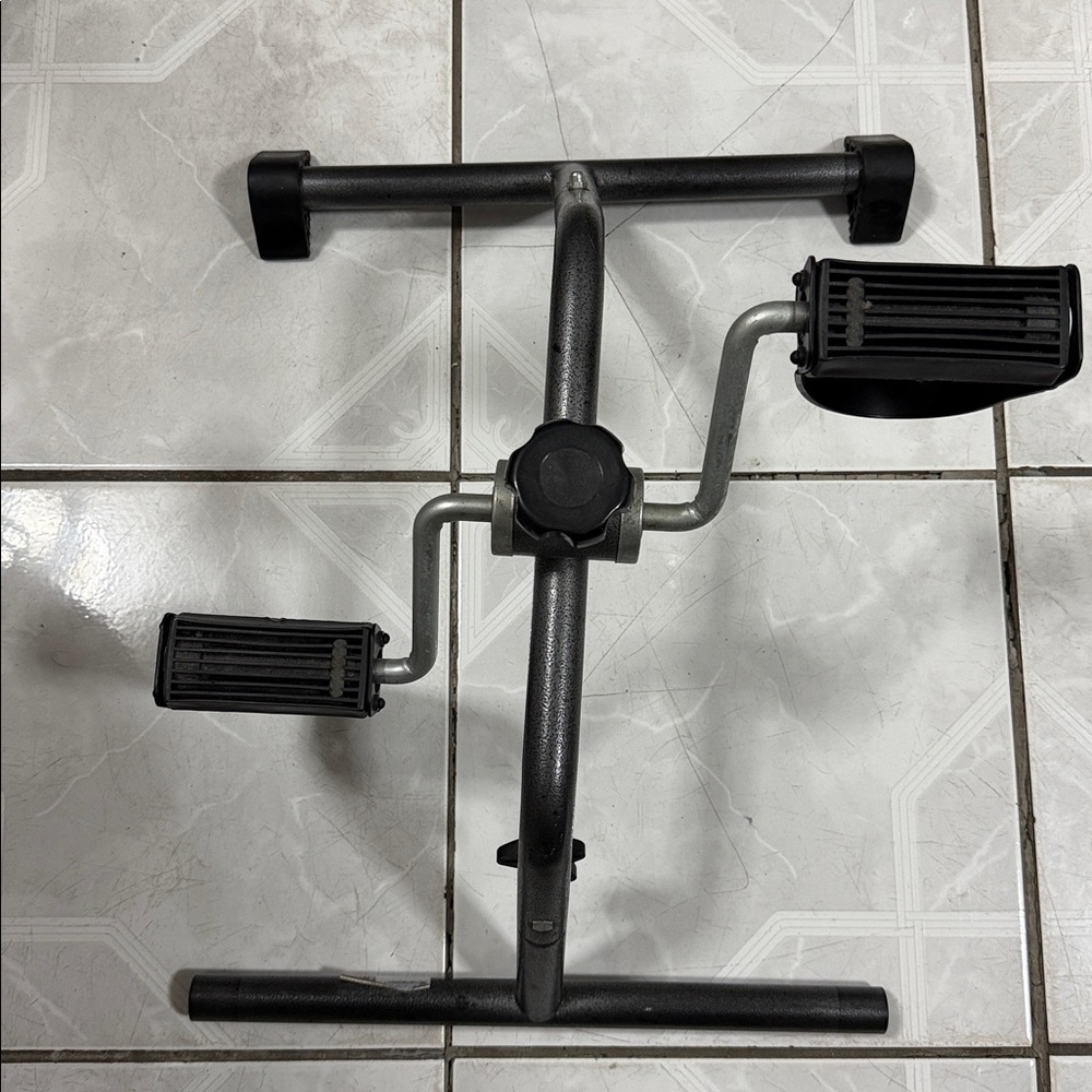 Portable Pedal Exerciser using feet or hand 
pedal exerciser while watching TV